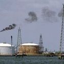Венесуэла выплатит компенсации нефтяным компаниям США за национализацию.